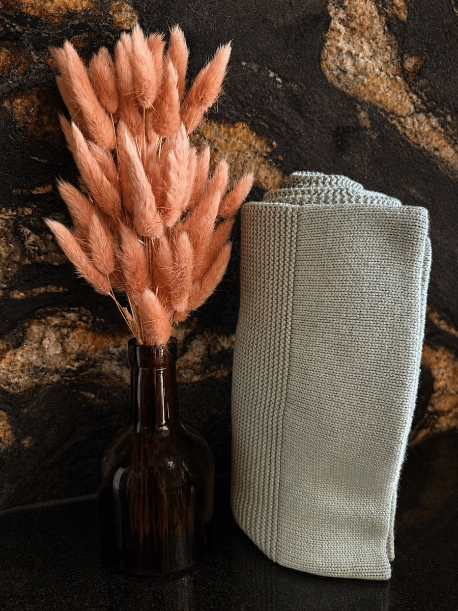 Knitted baby blanket · Sage